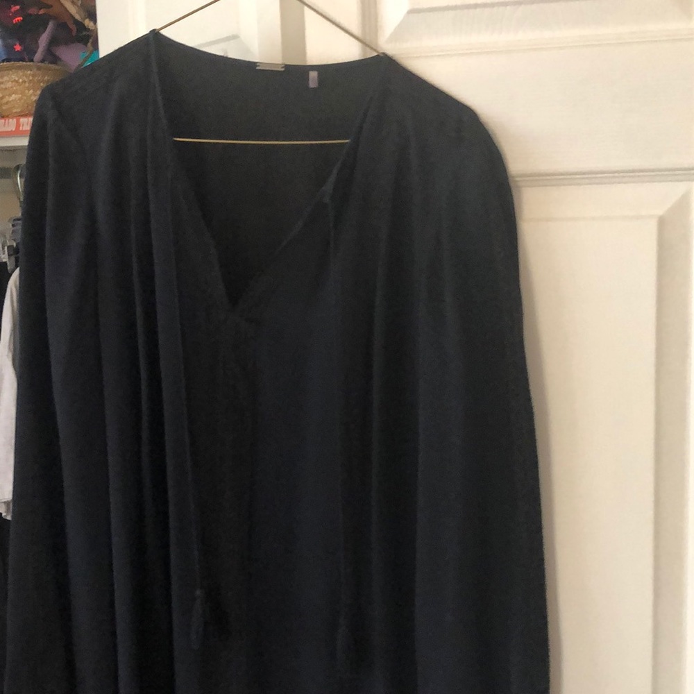 Size 12 , silk black lace trimmed dress .